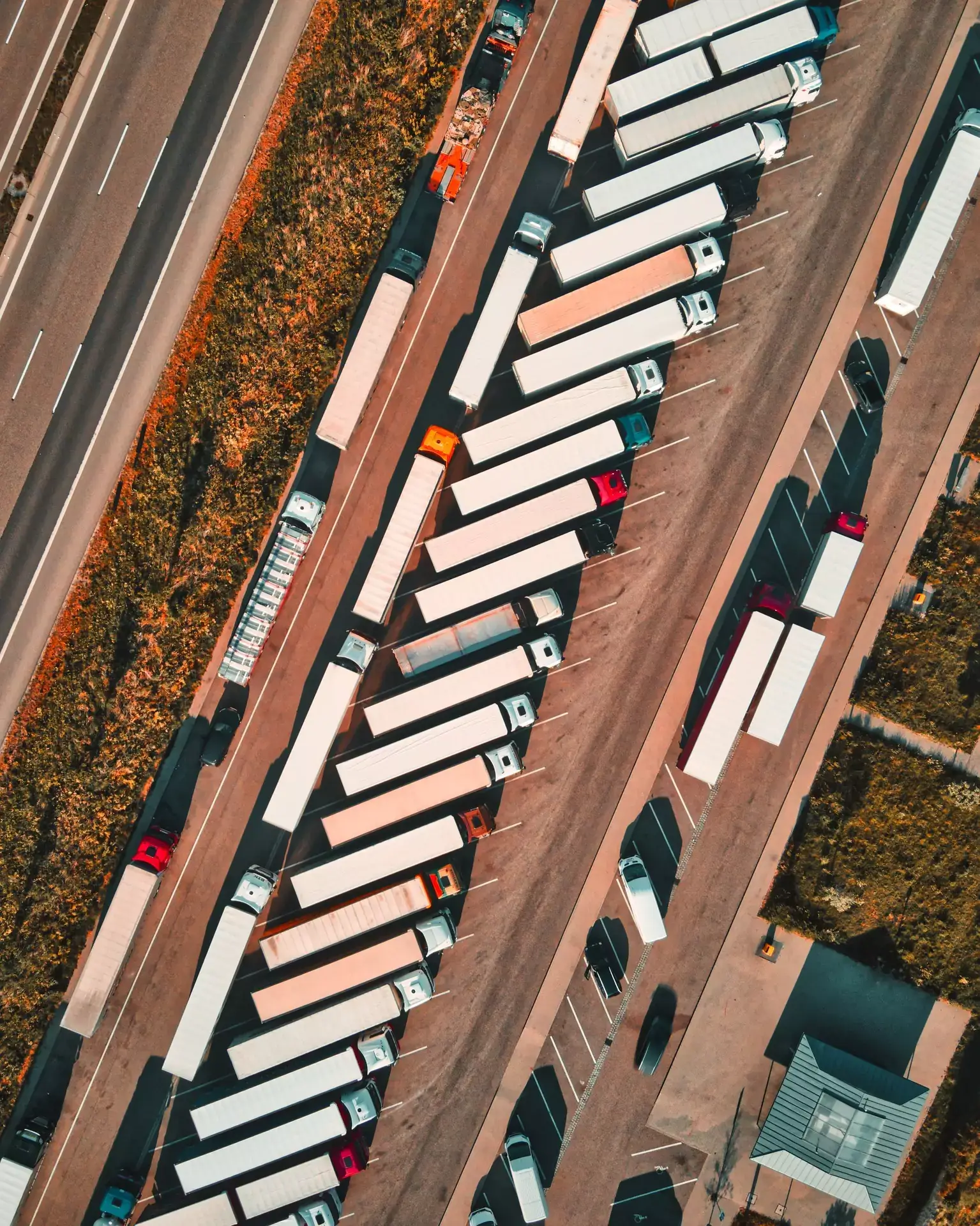 Freight Helpers pre-screened carrier trucks staged for loading